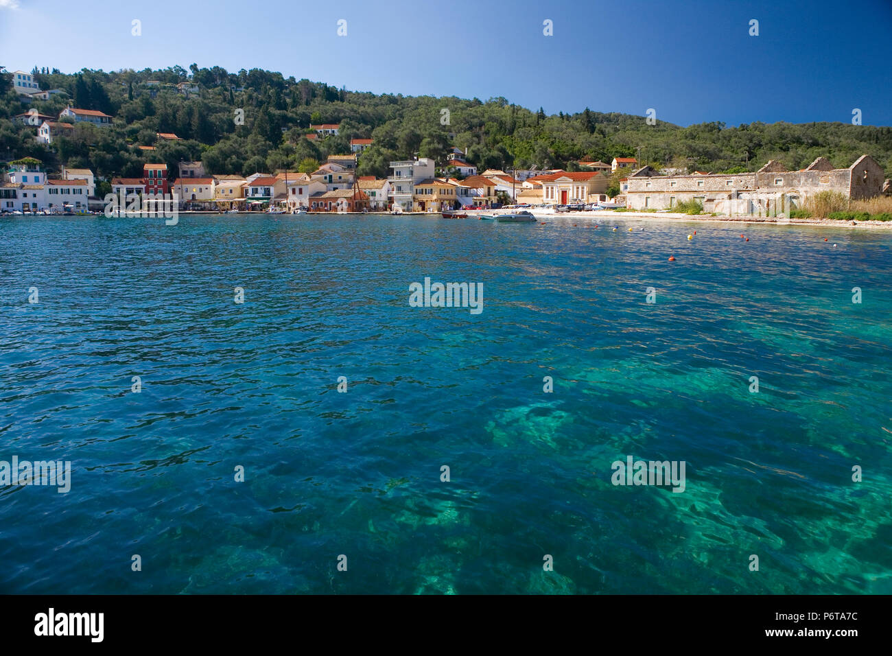The beautiful harbourside village of Loggos, Paxos, Greece Stock Photo ...