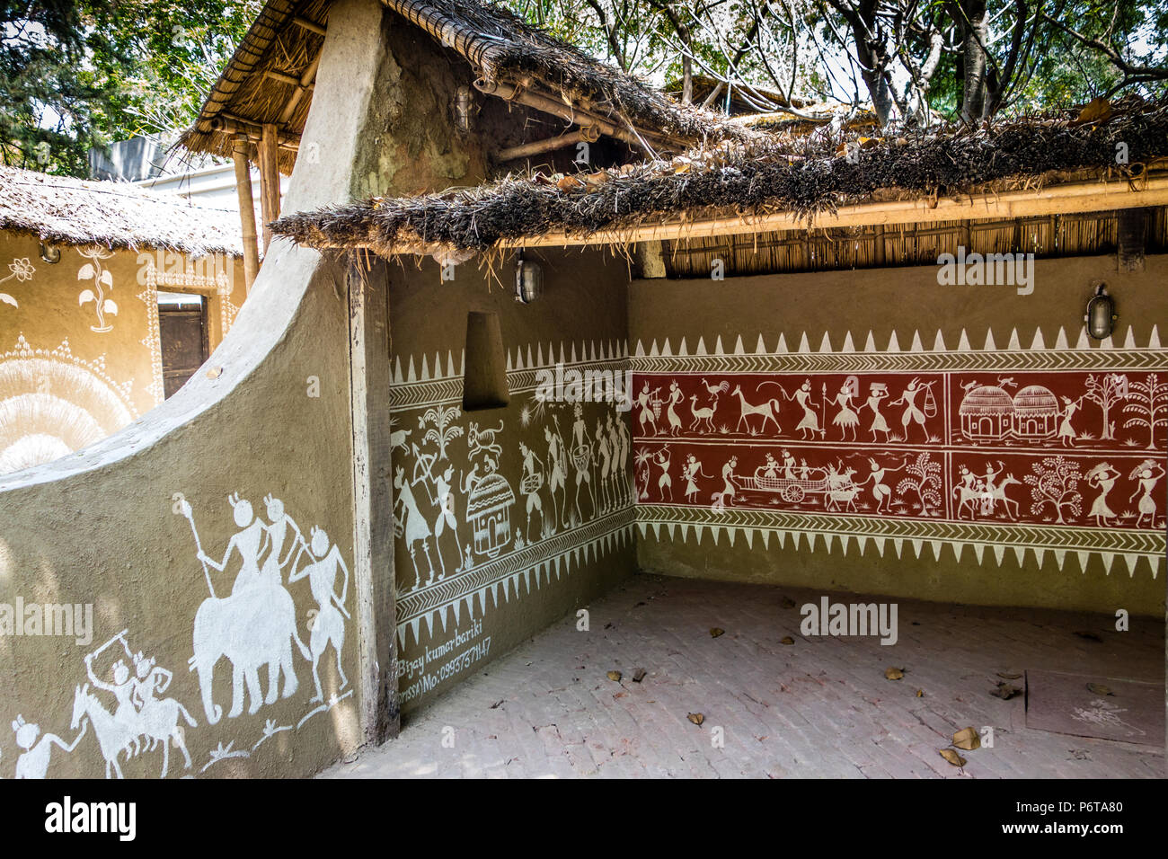 Exhibit of wall paintings on an Odisha Courtyard, National Crafts Museum, New Delhi, Delhi, India Stock Photo