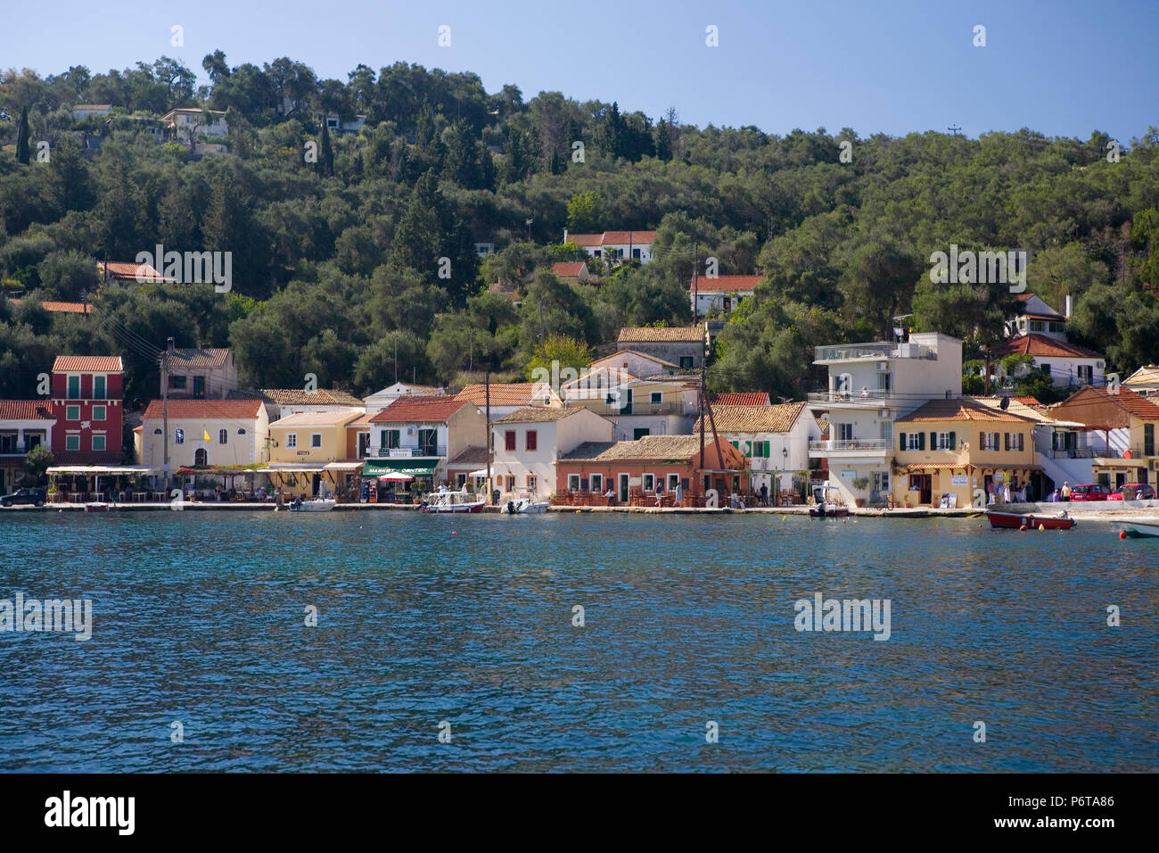 The Beautiful Harbourside Village Of Loggos Paxos Greece Stock Photo the-beautiful-harbourside-village-of-loggos-paxos-greece-stock-photo