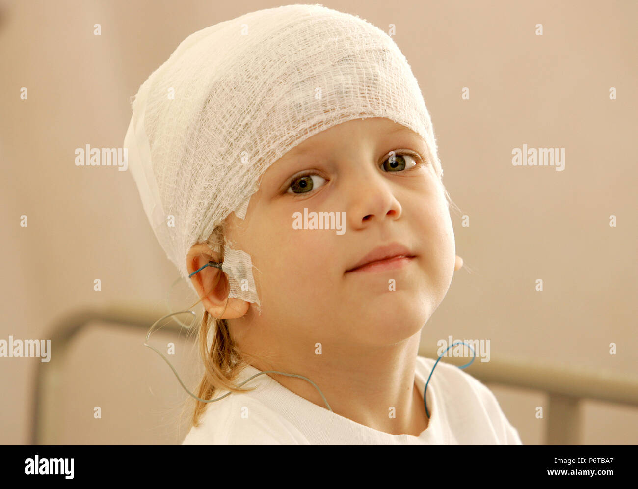 A young boy recovers from brain tumor surgery at a local hospital Stock ...