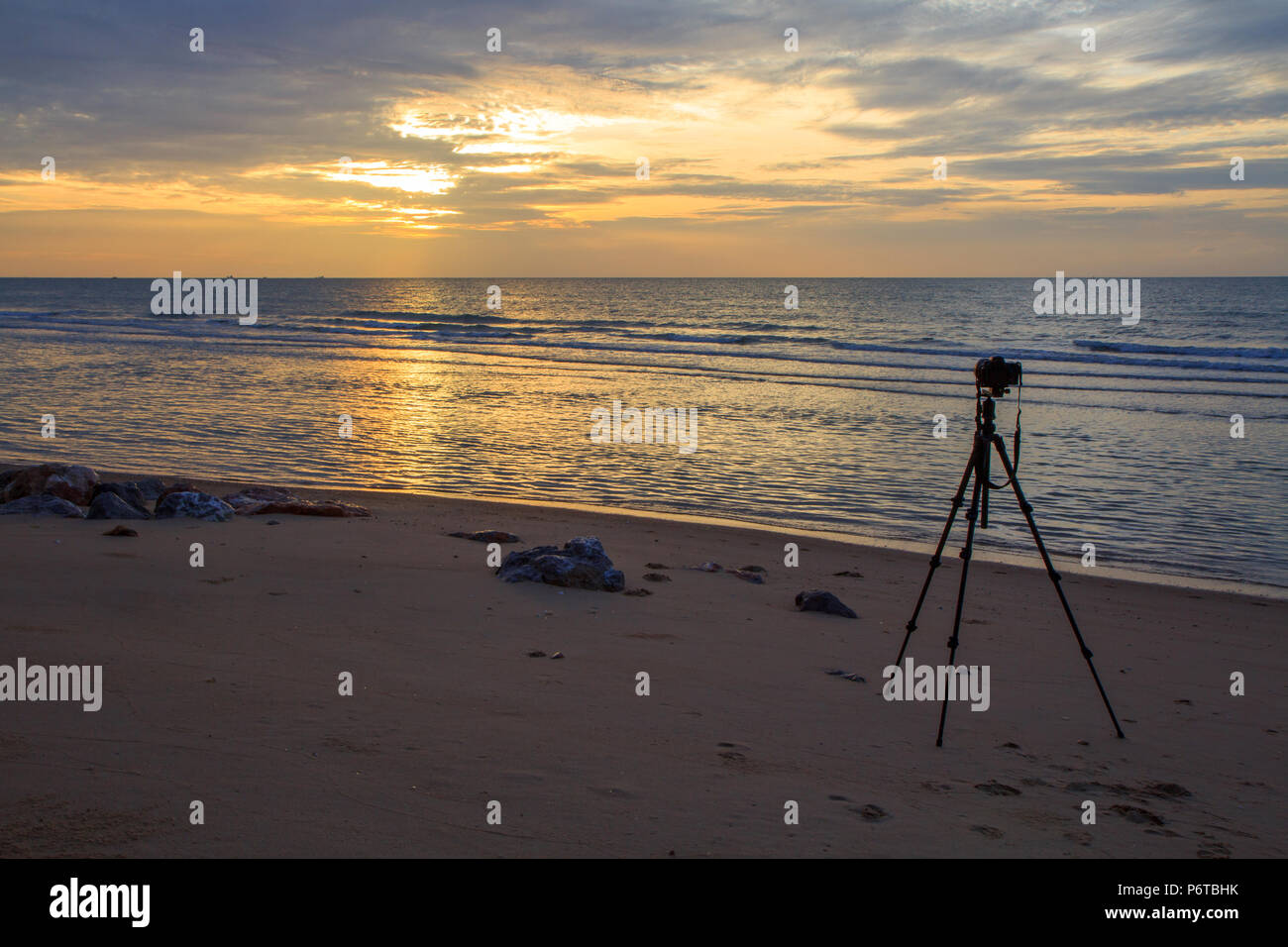 Tripod of Photographer take the photo of the sea in sunrise time Stock ...