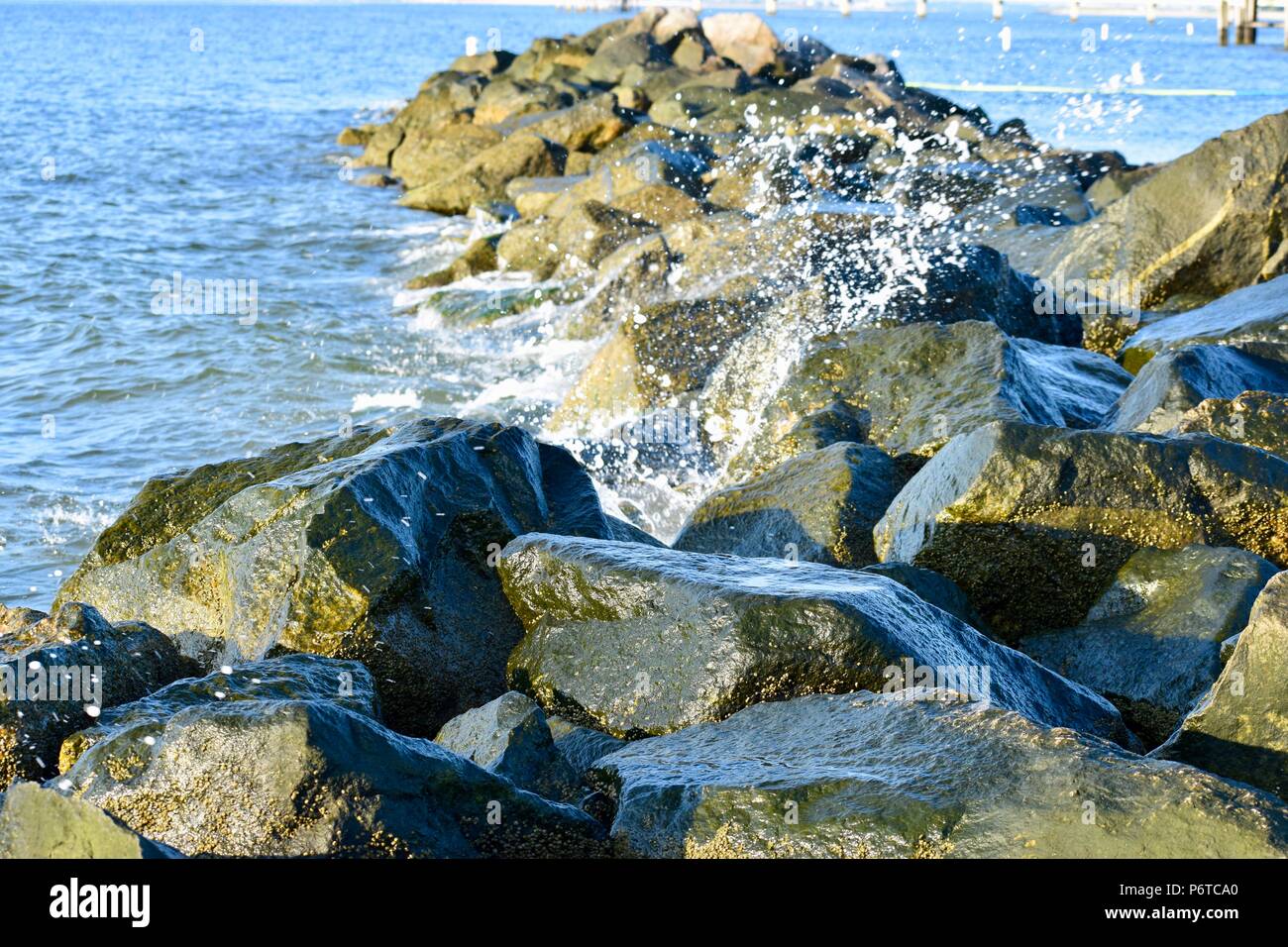 Water on ocean rocks Stock Photo - Alamy
