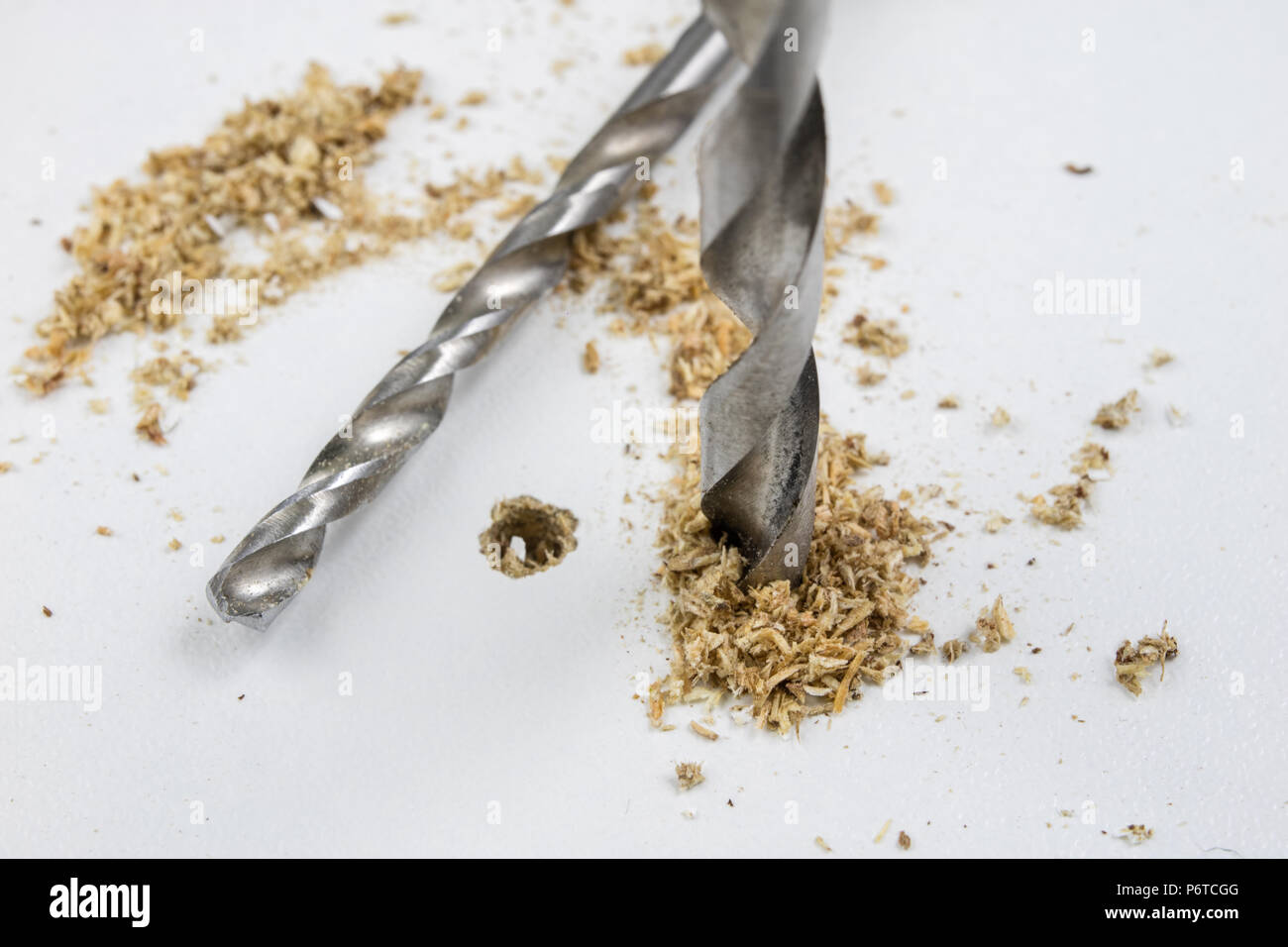 Drilling holes in chipboard. Joinery accessories used in the