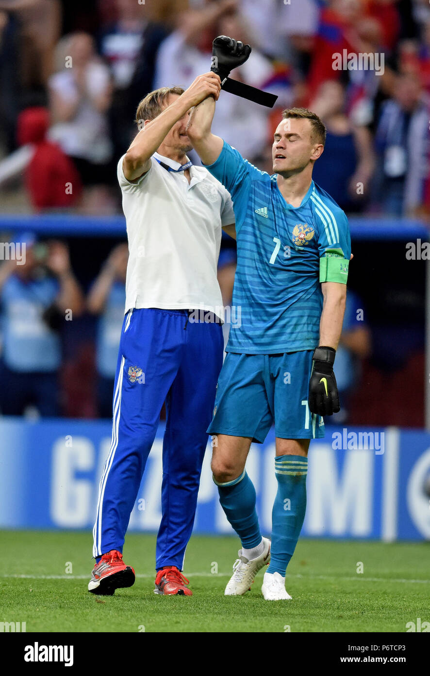 Moscow, Russia - July 1, 2018. Goalkeeper coach Gintaras Stauche goalkeeper Igor Akinfeev after penalty shootout in FIFA World Cup 2018 Round of 16 ma Stock Photo