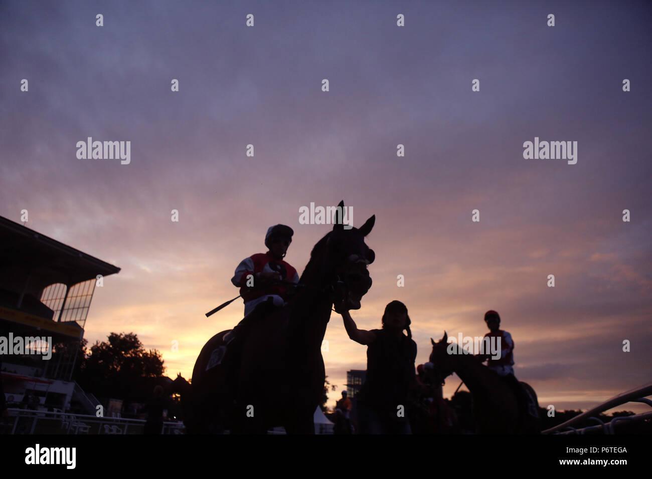 Hamburg, silhouette, horses and jockeys Stock Photo