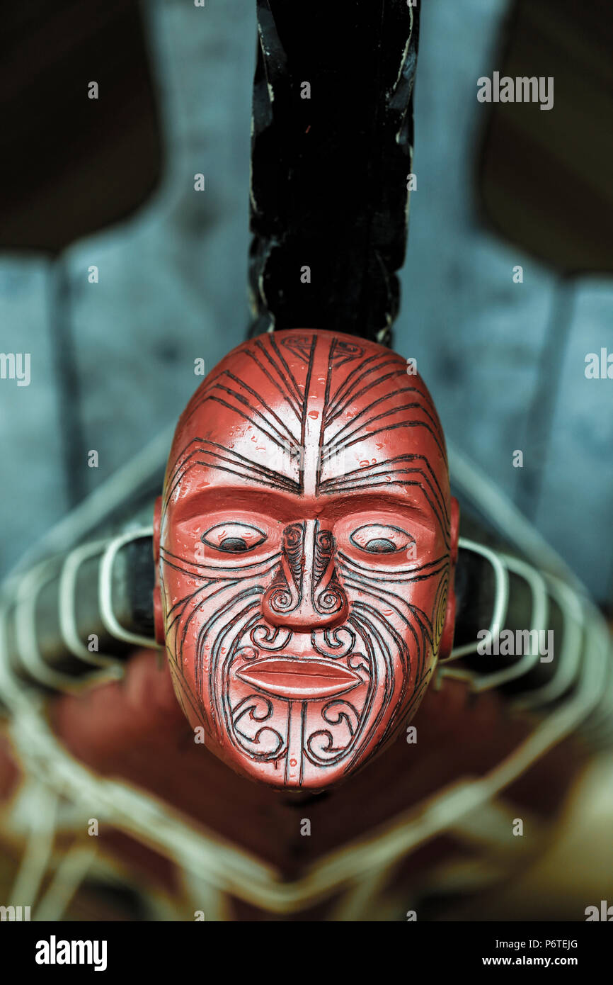 Carving on front of ceremonial waka taua (war canoe) at the Waitangi treaty grounds in Waitangi, New Zealand Stock Photo