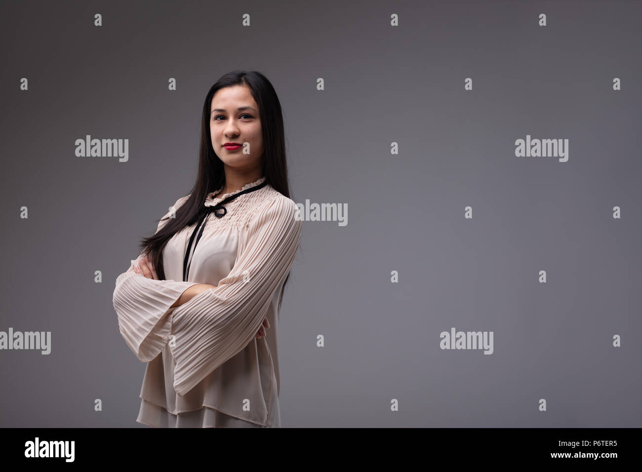 proud asian youg woman shows off her pride to be the chief executive officer of her enterprise and of her whole life Stock Photo