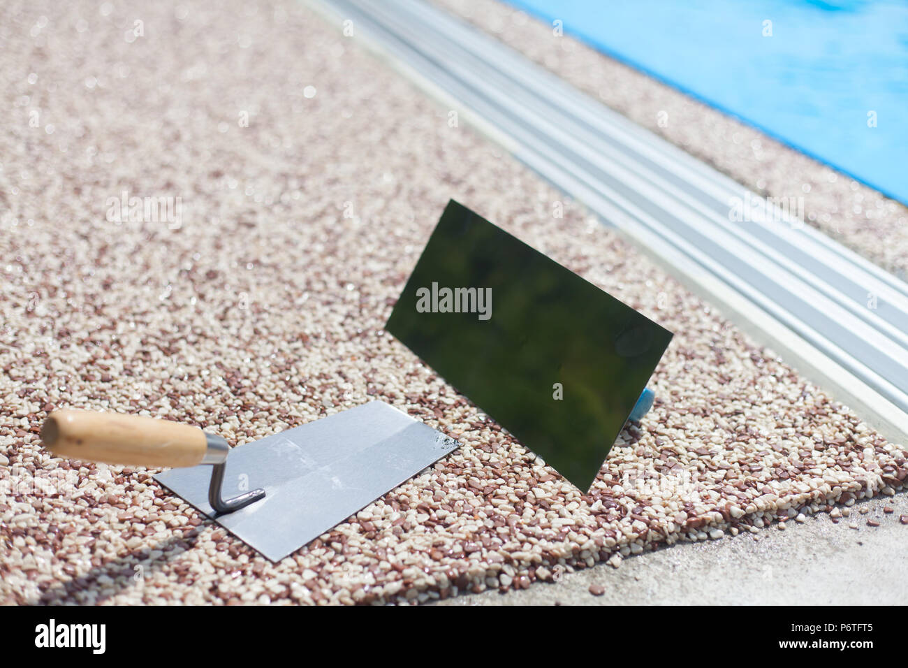 Coloured Concrete Around Pool with tools Stock Photo Alamy
