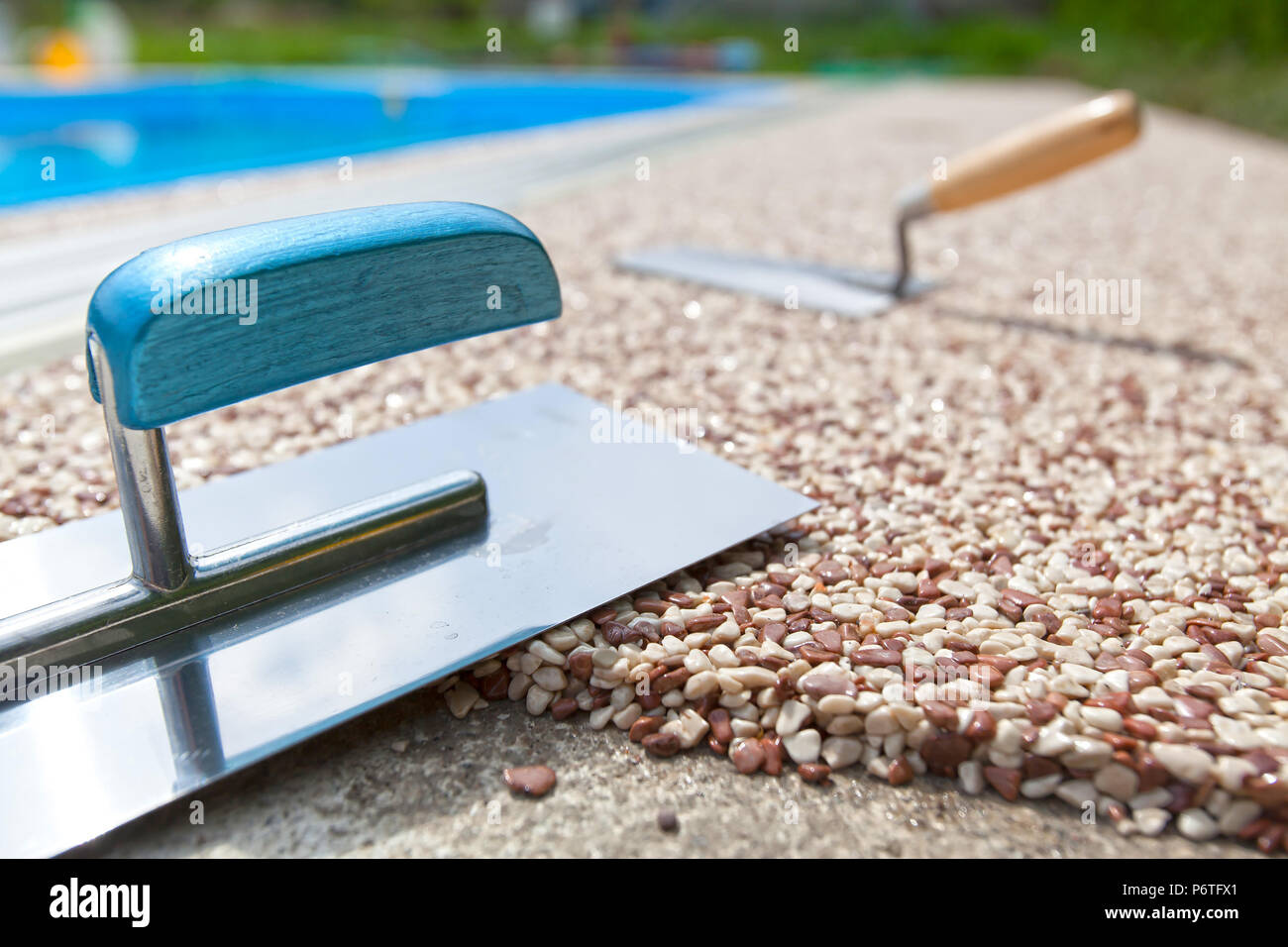 Coloured Concrete Around Pool with tools Stock Photo Alamy