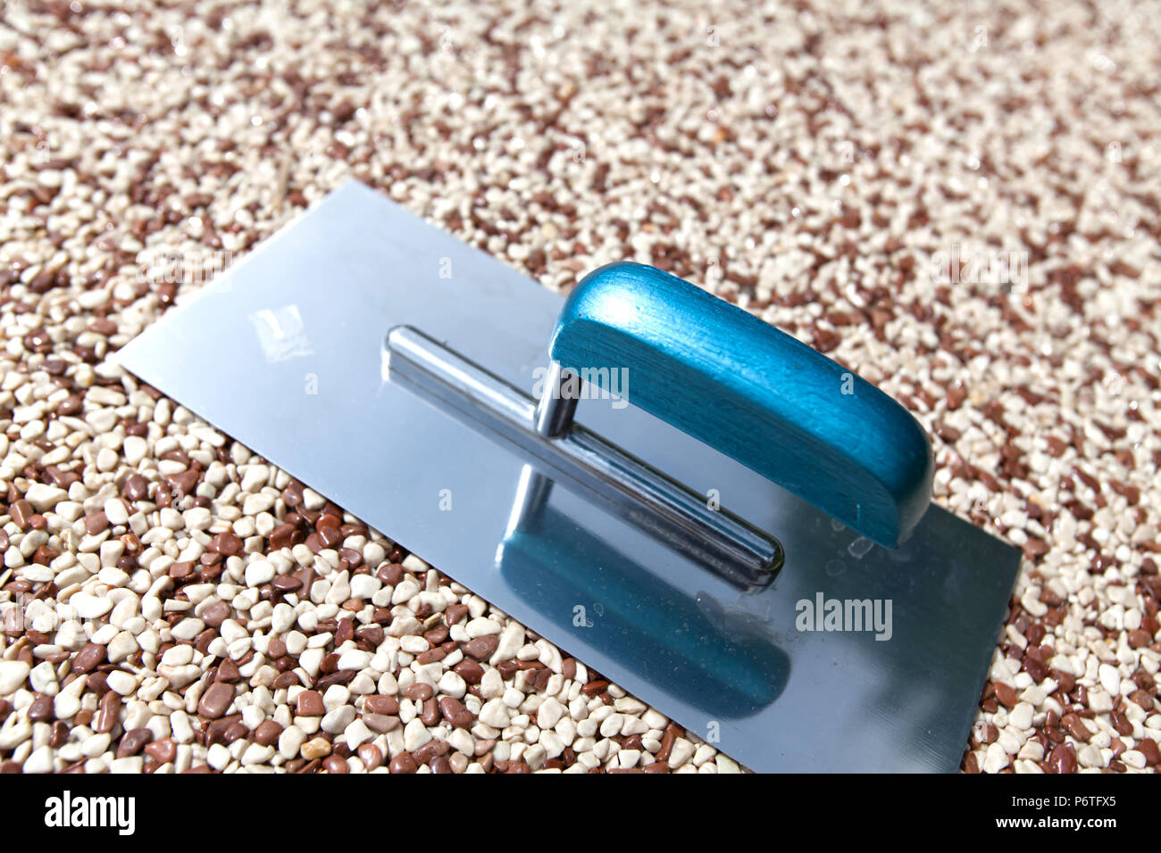 Coloured Concrete Around Pool with tools Stock Photo