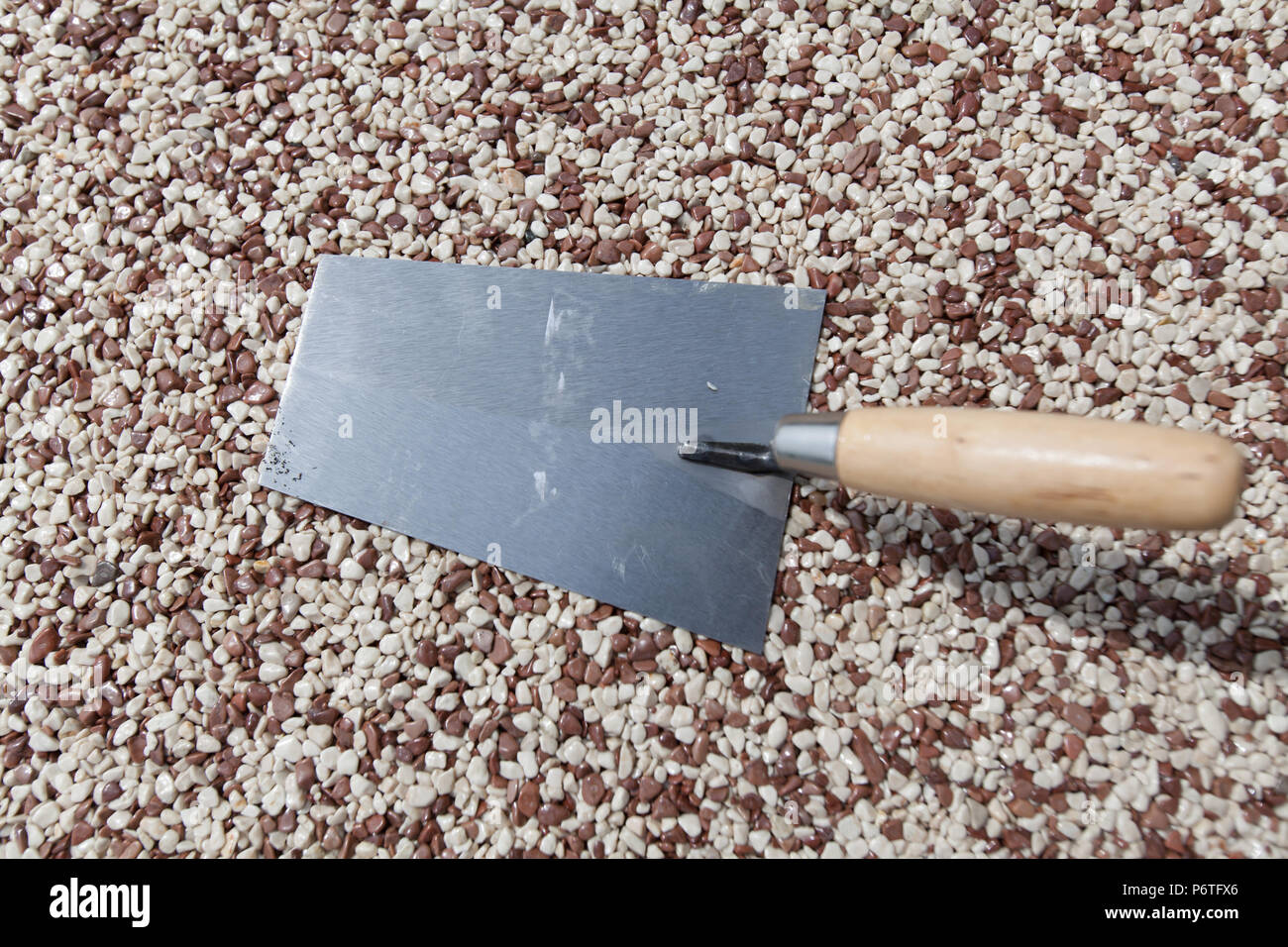 Coloured Concrete Around Pool with tools Stock Photo
