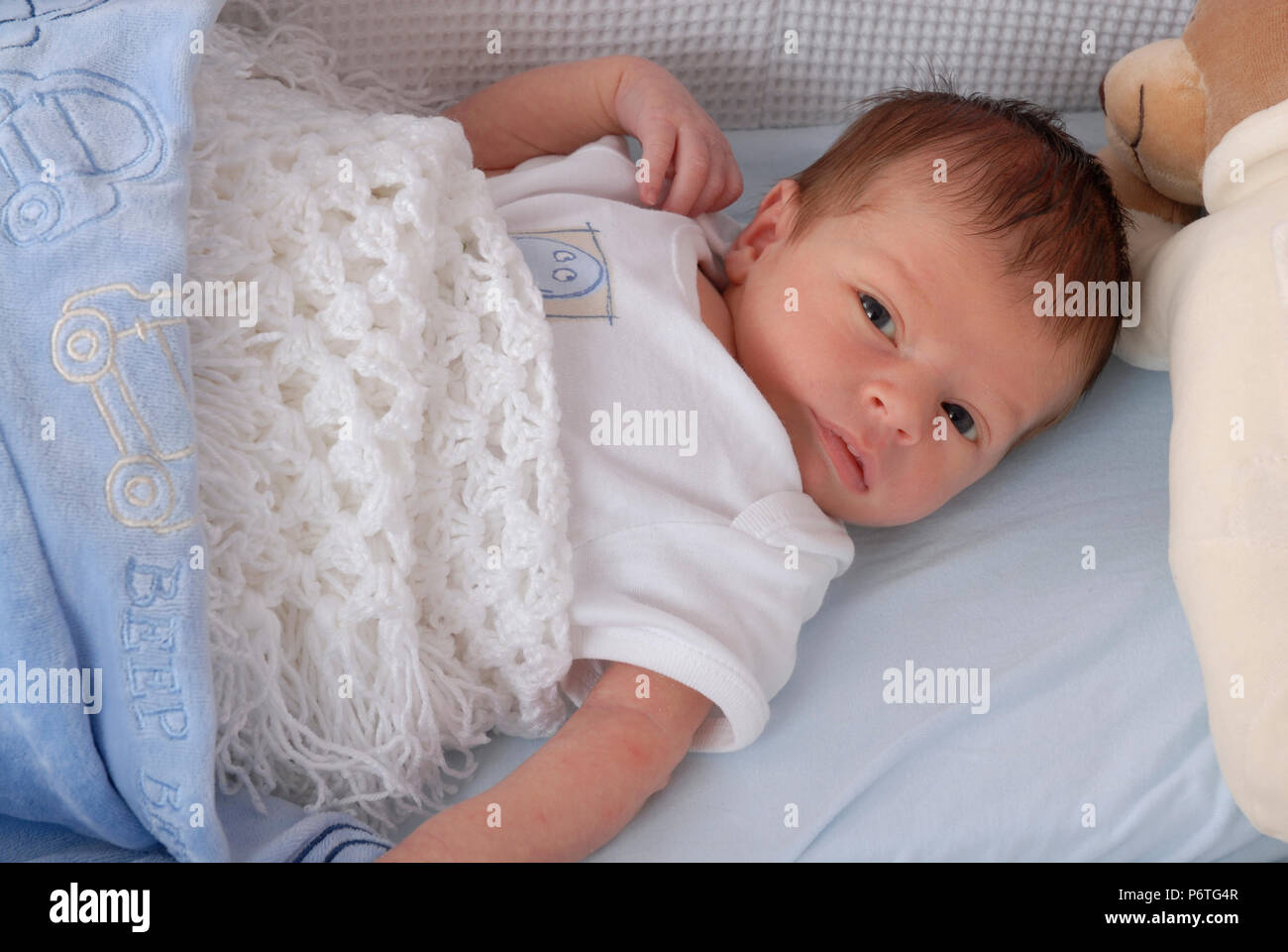 Baby lying awake in cot hires stock photography and images Alamy