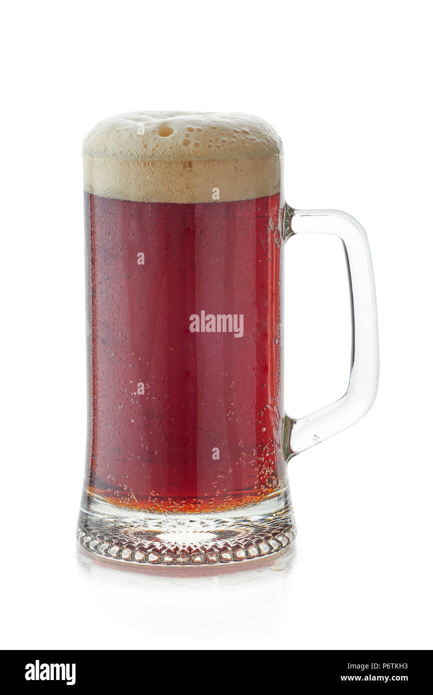 Mug of dark beer with foam head on white Stock Photo Alamy