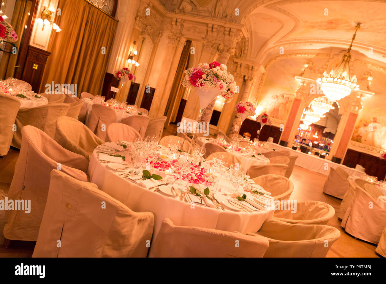 Renaissance Style Wedding Reception Room and Candle Lit Tables Stock