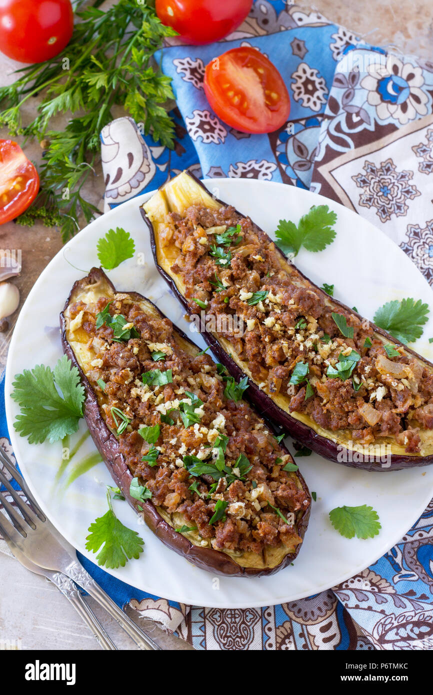 Baked eggplants with meat, walnut and vegetables. Traditional middle