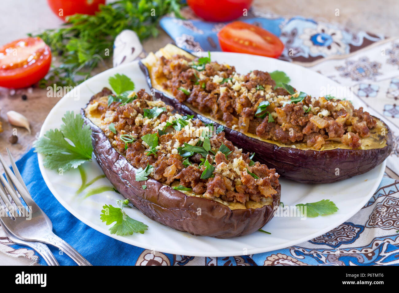 Baked eggplants with meat, walnut and vegetables. Traditional middle