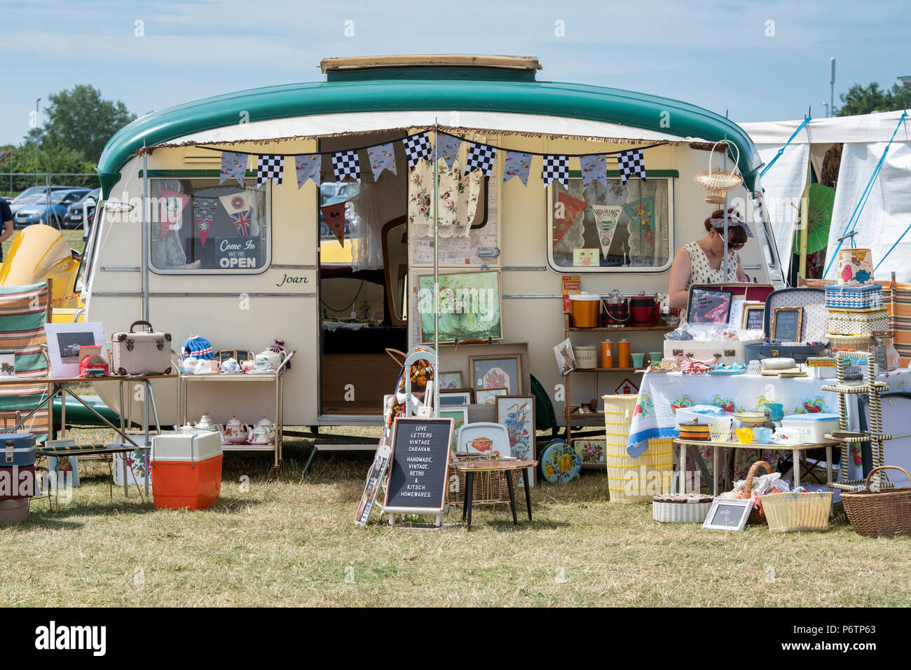 Vintage boutique stall and caravan at the flywheel festival. Bicester