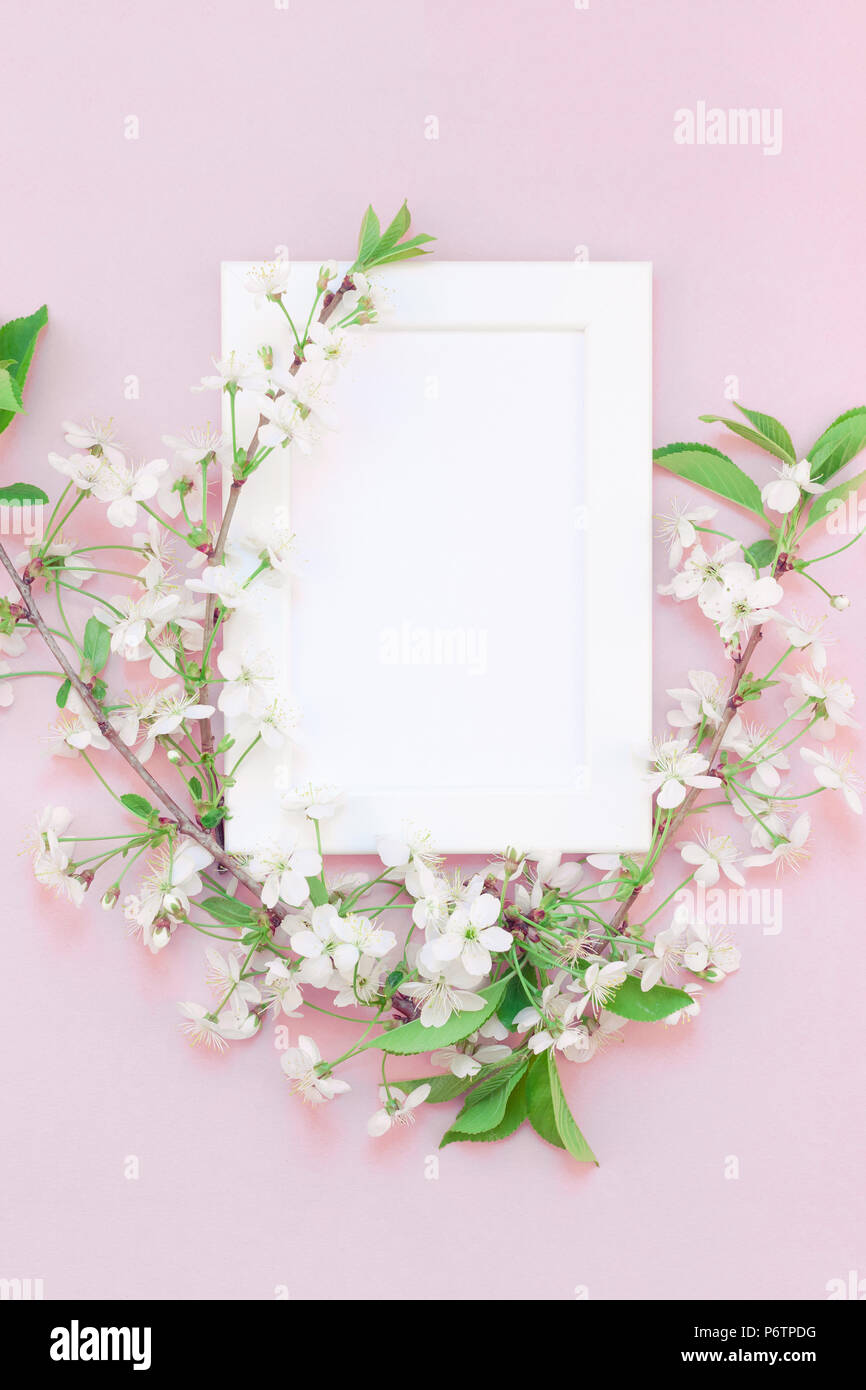 Creative flat lay concept top view of blank frame mock up and cherry ...