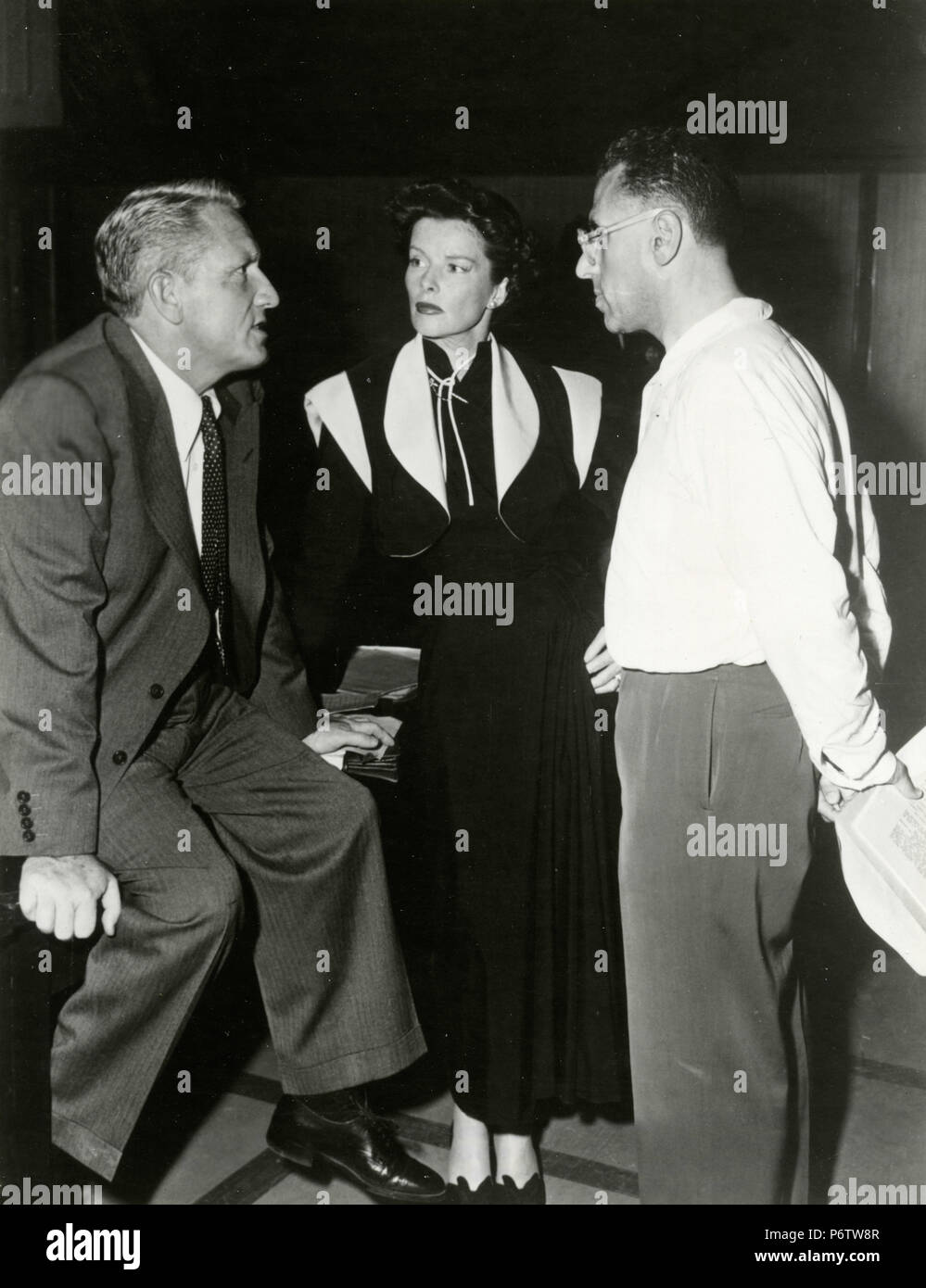 Actors Spencer Tracy and Katharine Hepburn with director George Cukor, 1940s Stock Photo