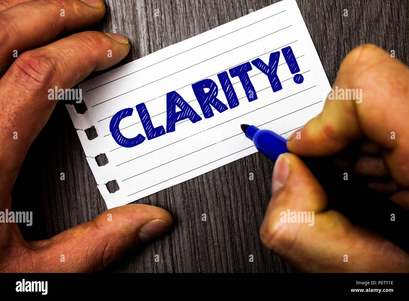 Writing note showing Clarity. Business photo showcasing Certainty Precision Purity Comprehensibility Transparency Accuracy Man hold holding marker no Stock Photo