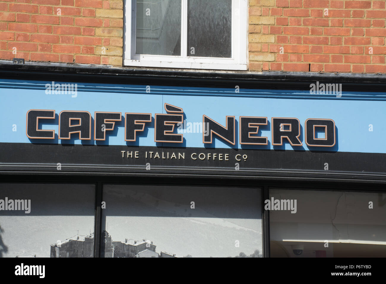 Exterior of Caffe Nero coffee shop, the Italian coffee company, with sign, UK Stock Photo