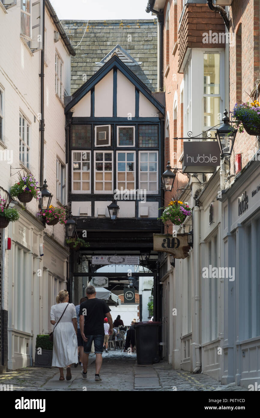 The Angel Hotel courtyard and narrow cobbled street off the high street in Guildford town centre, Surrey, UK Stock Photo