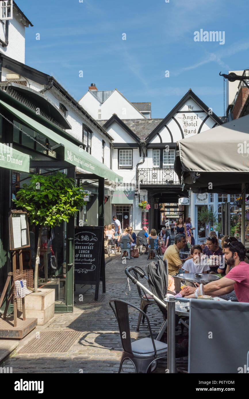 The Angel Hotel courtyard and narrow cobbled street off the high street in Guildford town centre, Surrey, UK Stock Photo