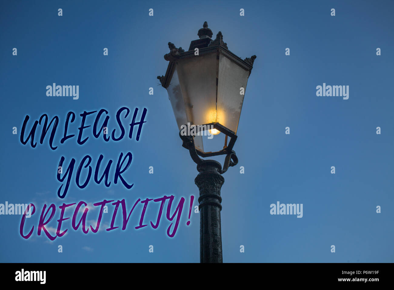 Handwriting text writing Unleash Your Creativity Call. Concept meaning Develop Personal Intelligence Wittiness Wisdom Light post blue sky enlighten id Stock Photo