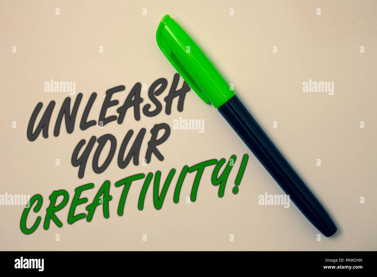 Handwriting text writing Unleash Your Creativity Call. Concept meaning Develop Personal Intelligence Wittiness Wisdom Ideas message beige background g Stock Photo