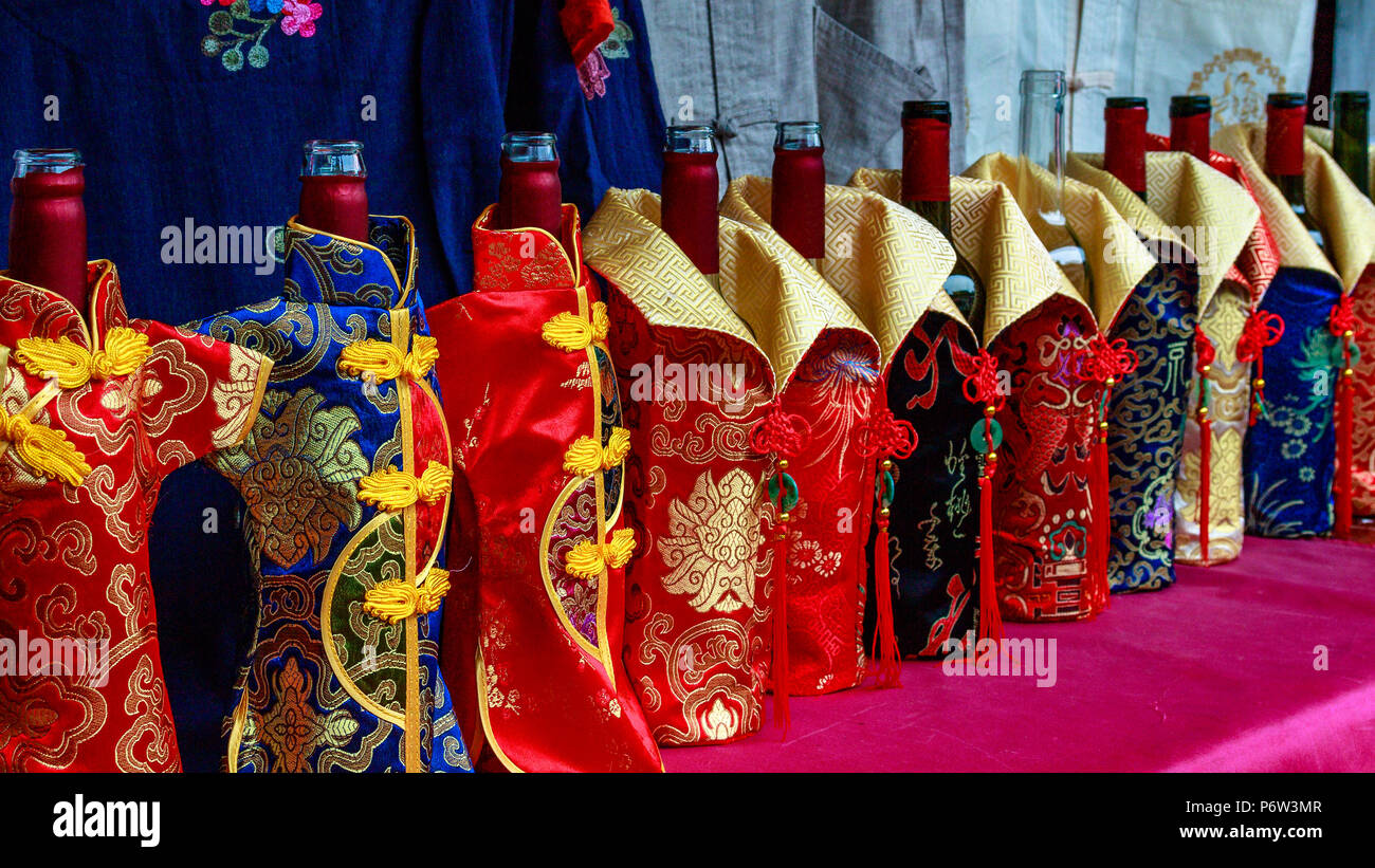 Bottles dressed in special costumes. Stock Photo