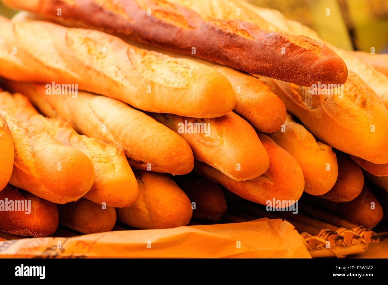 French bread, French sticks, baquettes, freshly baked, stacked two to