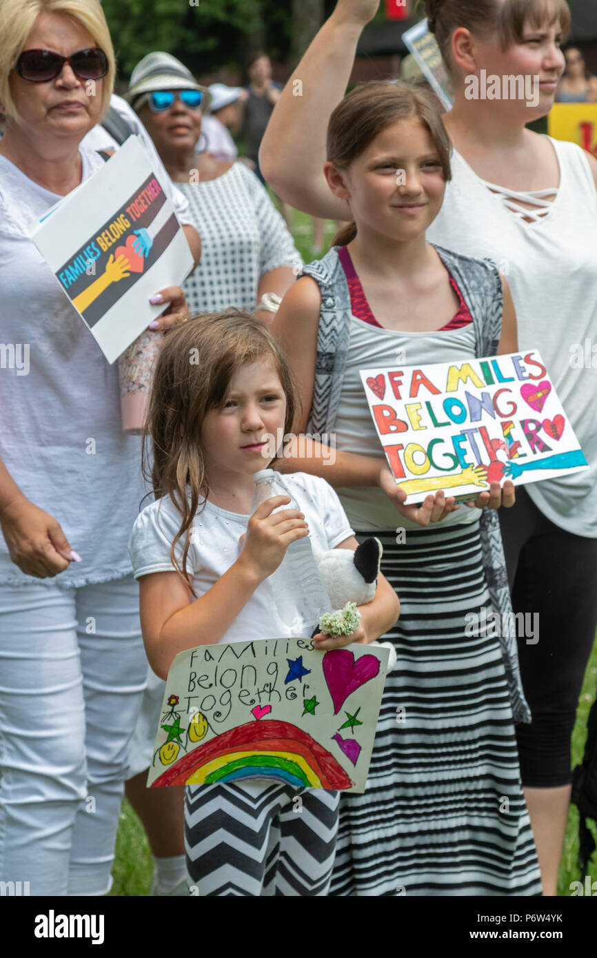 Detroit, Michigan - Protesters oppose the Trump administration's policy of separating young children from their parents at the U.S.-Mexico border. The Stock Photo