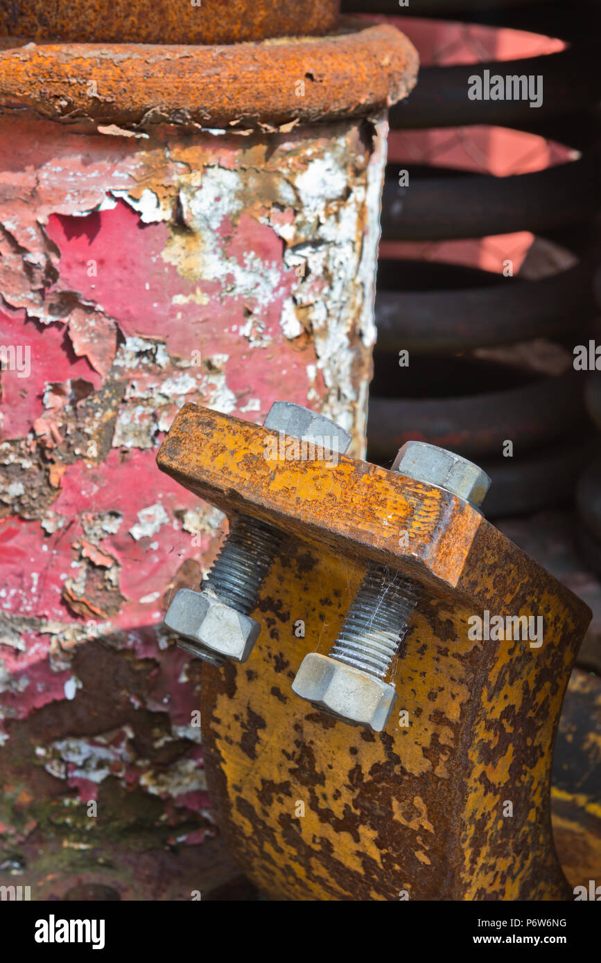 Scrap metal, nuts, bolts and buffers from old trains, on the scrap pile