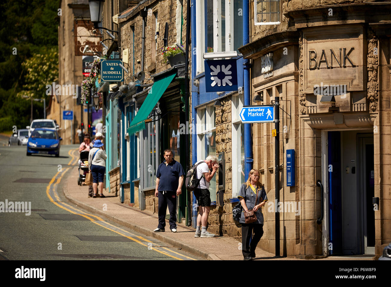 Sandstone shops and Royal Bank of Scotland on  Bridge Street, Ramsbottom village, Lancashire. Stock Photo