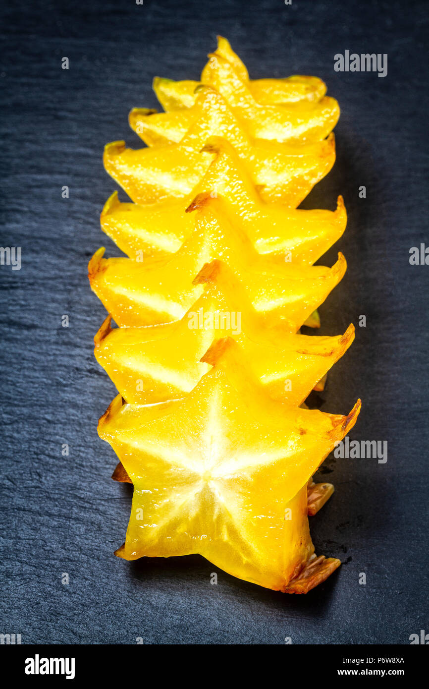 Sliced starfruit (Averrhoa carambola). Stock Photo