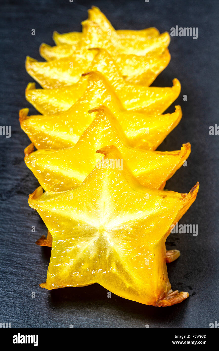 Sliced starfruit (Averrhoa carambola). Stock Photo