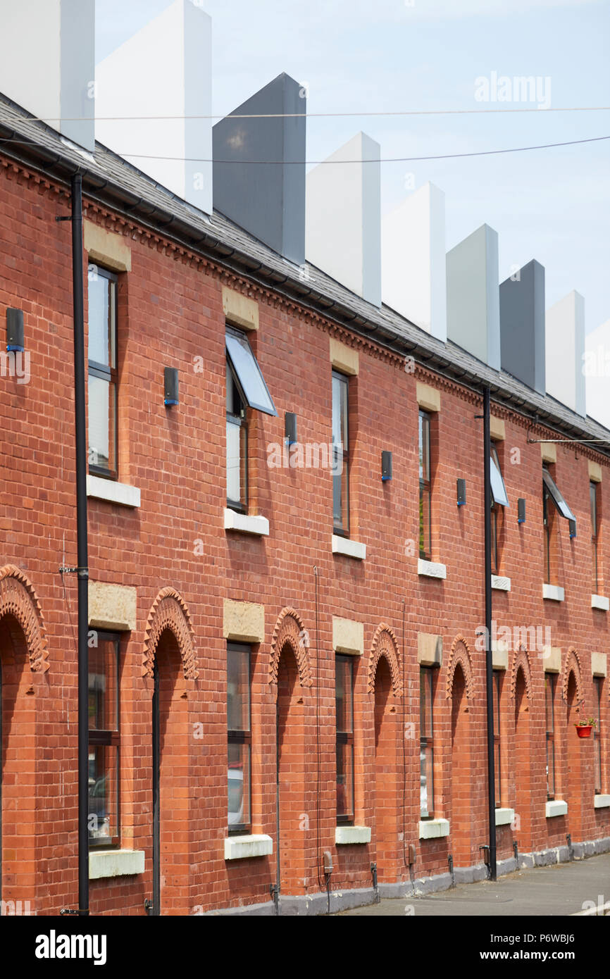 Chimney Pot Park is an urban community of upside down houses in Salford, Manchester. refurbished terraced houses in langworthy by Urbansplash Stock Photo