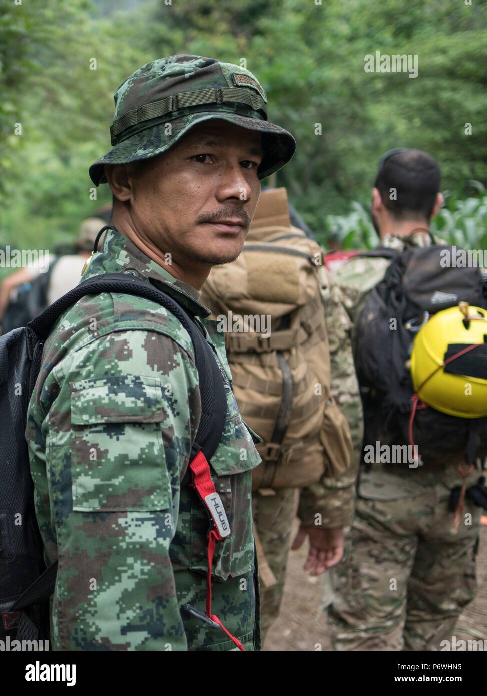 Chiang Rai, Thailand. 1st July, 2018. Thai Commandos and U.S. Air Force special operation airmen assist in search and rescue operations to locate 12 missing Thai children and their coach from the flooded Tham Luang cave July 1, 2018 near Chiang Rai, Thailand. Credit: Planetpix/Alamy Live News Stock Photo