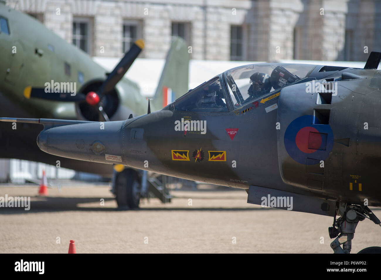Horse Guards Parade, London, UK. 3 July, 2018. A variety of RAF aircraft from past and present, including a Harrier GR3 VTOL fighter, a Falklands War veteran, are assembled on the central London parade ground as part of the RAF100 Aircraft Tour of Britain, celebrating the centenary of the RAF. Credit: Malcolm Park/Alamy Live News. Stock Photo
