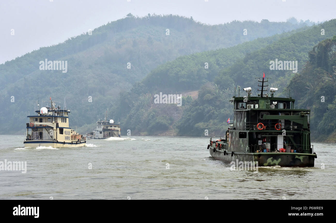 (180703) -- BEIJING, July 3, 2018 (Xinhua) -- Joint patrol vessels with law enforcement personnel from China, Thailand, Laos and Myanmar, sail on the Lancang-Mekong River, March 17, 2015. (Xinhua/Chen Haining) Stock Photo
