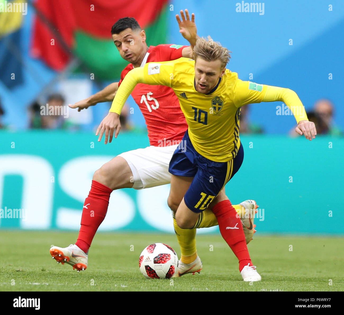Saint Petersburg, Russia. 3rd July, 2018. Blerim Dzemaili (L) of Switzerland vies with Emil Forsberg of Sweden during the 2018 FIFA World Cup round of 16 match between Switzerland and Sweden in Saint Petersburg, Russia, July 3, 2018. Credit: Xu Zijian/Xinhua/Alamy Live News Stock Photo