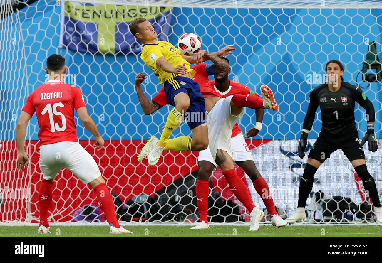Saint Petersburg, Russia. 3rd July, 2018. Viktor Claesson (top) of Sweden competes during the 2018 FIFA World Cup round of 16 match between Switzerland and Sweden in Saint Petersburg, Russia, July 3, 2018. Credit: Yang Lei/Xinhua/Alamy Live News Stock Photo