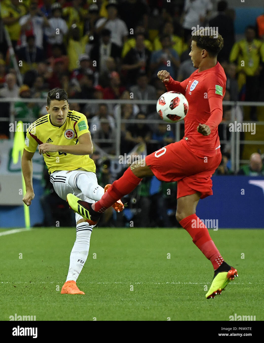Moscow, Russia. 3rd July, 2018. Dele Alli (R) of England vies with Santiago Arias of Colombia during the 2018 FIFA World Cup round of 16 match between England and Colombia in Moscow, Russia, July 3, 2018. Credit: He Canling/Xinhua/Alamy Live News Stock Photo