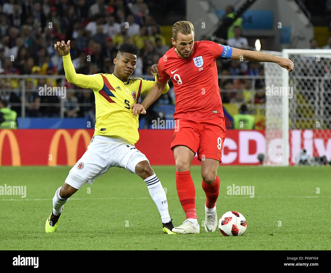 Moscow, Russia. 3rd July, 2018. Harry Kane (R) of England vies with Wilmar Barrios of Colombia during the 2018 FIFA World Cup round of 16 match between England and Colombia in Moscow, Russia, July 3, 2018. Credit: He Canling/Xinhua/Alamy Live News Stock Photo