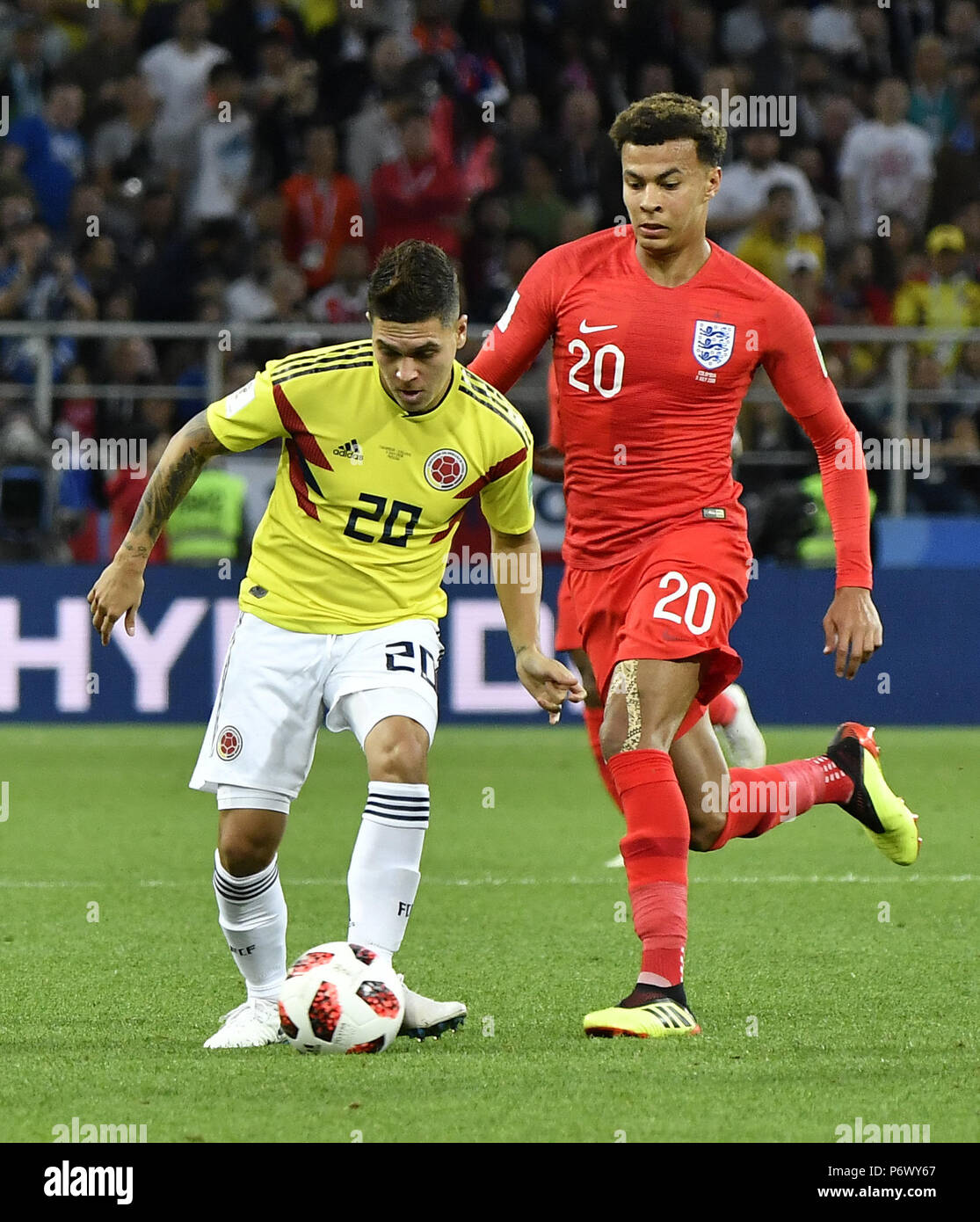 Moscow, Russia. 3rd July, 2018. Dele Alli (R) of England vies with Juan Quintero of Colombia during the 2018 FIFA World Cup round of 16 match between England and Colombia in Moscow, Russia, July 3, 2018. Credit: He Canling/Xinhua/Alamy Live News Stock Photo