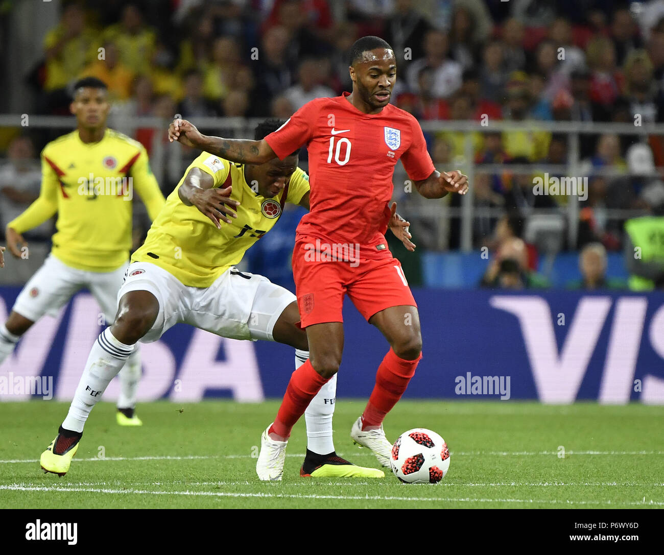 Moscow, Russia. 3rd July, 2018. Raheem Sterling (R) of England competes during the 2018 FIFA World Cup round of 16 match between England and Colombia in Moscow, Russia, July 3, 2018. Credit: He Canling/Xinhua/Alamy Live News Stock Photo
