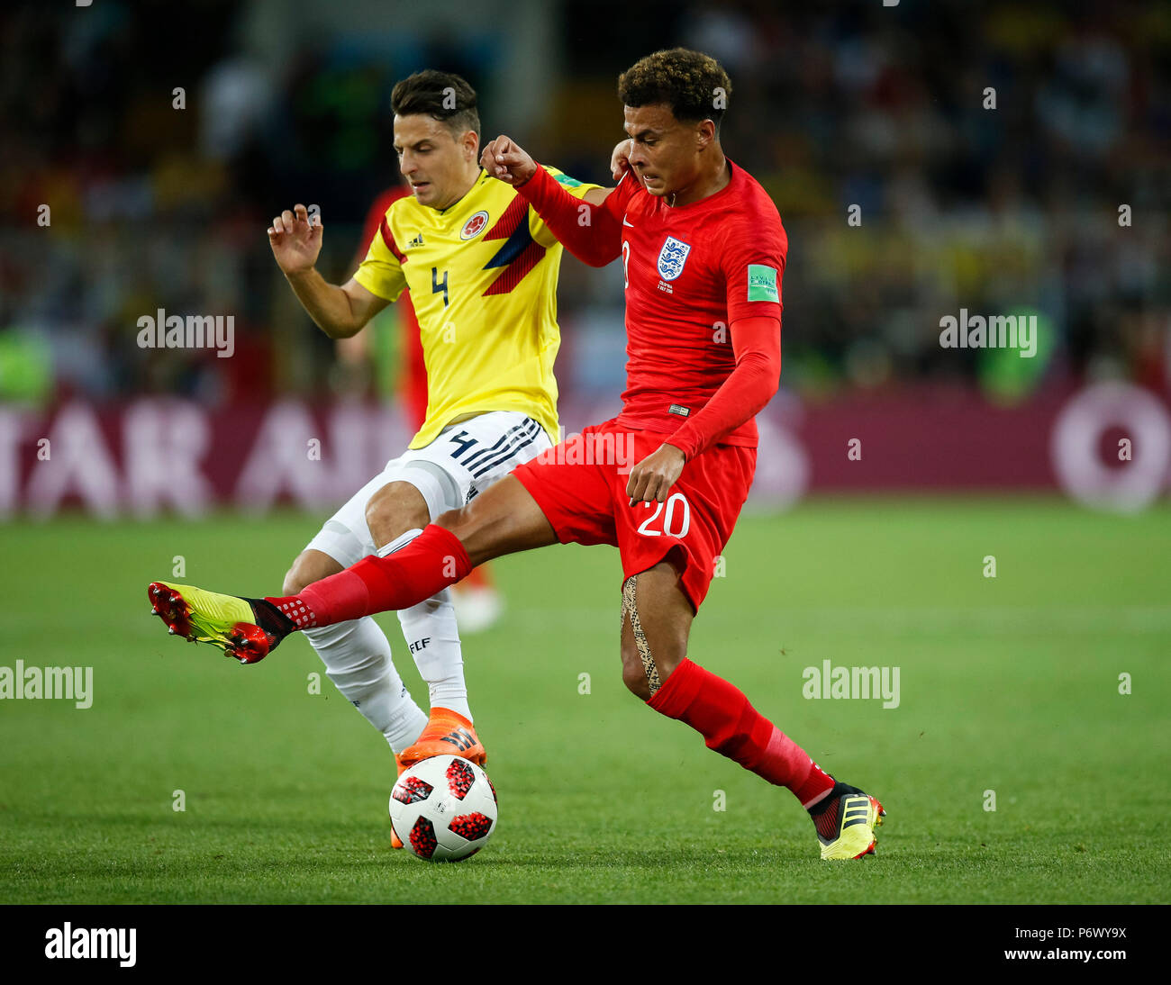 Moscow, Russia. 3rd July, 2018. Dele Alli of England and Santiago Arias of Colombia during the 2018 FIFA World Cup Round of 16 match between Colombia and England at Spartak Stadium on July 3rd 2018 in Moscow, Russia. Credit: PHC Images/Alamy Live News Stock Photo