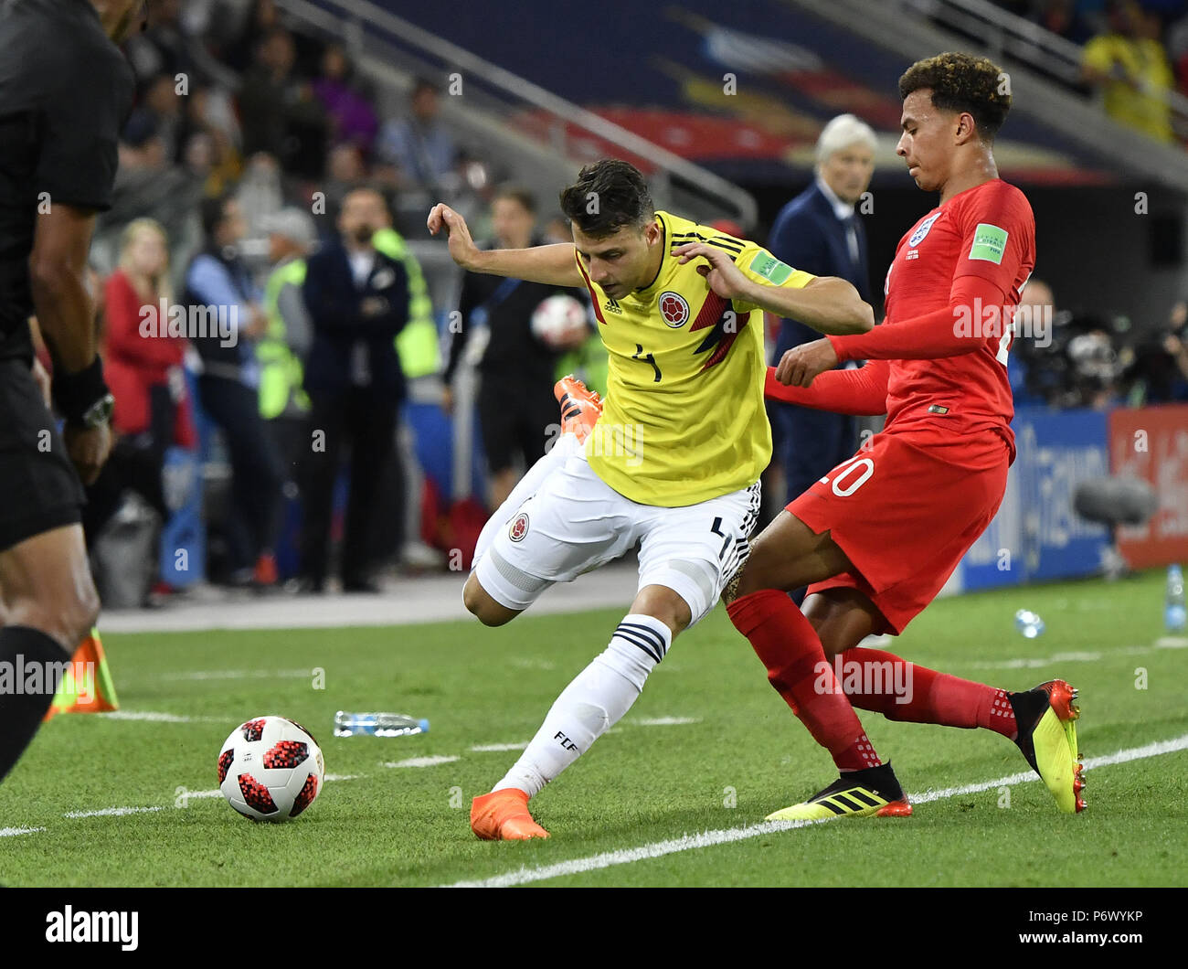 Moscow, Russia. 3rd July, 2018. Dele Alli (R) of England vies with Santiago Arias of Colombia during the 2018 FIFA World Cup round of 16 match between England and Colombia in Moscow, Russia, July 3, 2018. Credit: He Canling/Xinhua/Alamy Live News Stock Photo