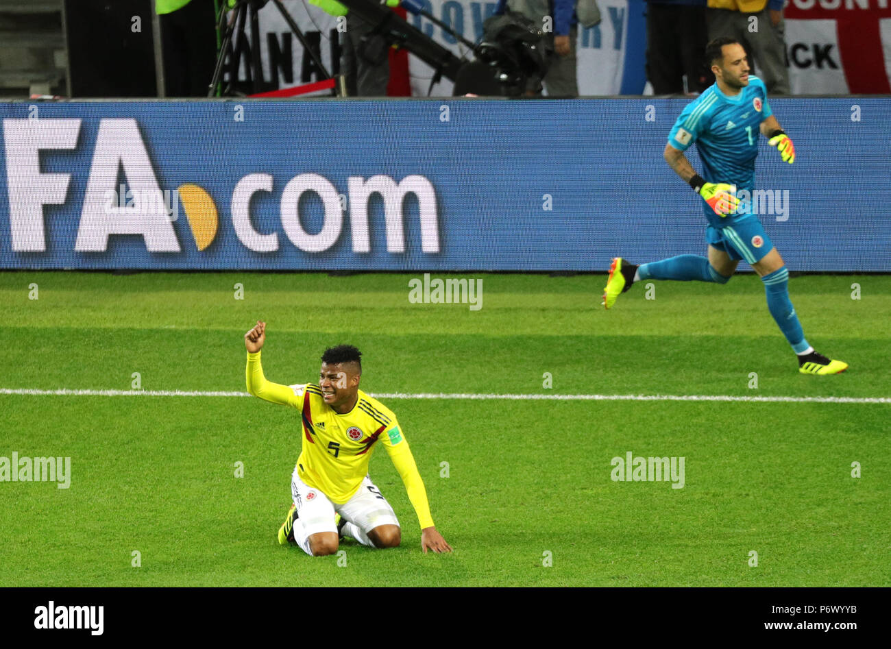 Moscow, Russia. 03rd July, 2018. Soccer: World Cup, Eighth finals, Colombia vs England in the Spartak Stadium. Colombia's Wilmar Barrios kneeling on the pitch while goalkeeper David Ospina can be seen in the background. Credit: Christian Charisius/dpa/Alamy Live News Stock Photo