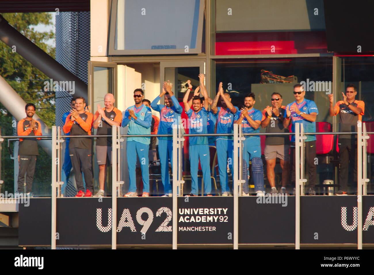 Manchester, England, 3 July 2018. The Indian team on the balcony celebrating when Lokesh Rahul reached his century against England in the first Vitality T20 International at Emirates Old Trafford. Credit: Colin Edwards/Alamy Live News. Stock Photo